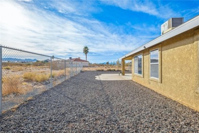 Explore this semi-custom home in the Valle Vista community on Valle Vista Golf Course in Arizona - for sale on GolfHomes.com, golf home, golf lot