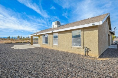 Explore this semi-custom home in the Valle Vista community on Valle Vista Golf Course in Arizona - for sale on GolfHomes.com, golf home, golf lot