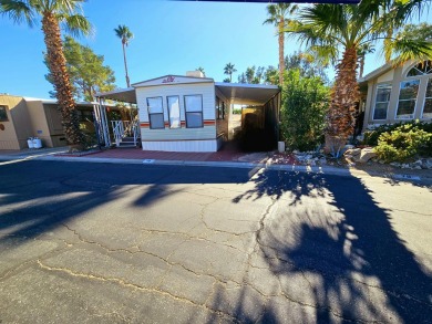 This charming 1990 1-bedroom, 1-bath mobile home is located in on Sands RV and Golf Resort in California - for sale on GolfHomes.com, golf home, golf lot