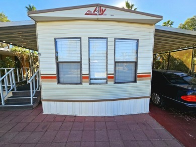 This charming 1990 1-bedroom, 1-bath mobile home is located in on Sands RV and Golf Resort in California - for sale on GolfHomes.com, golf home, golf lot