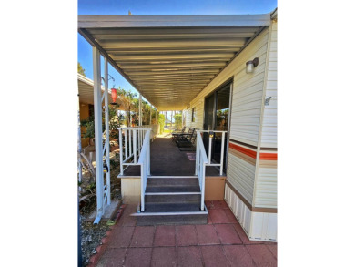 This charming 1990 1-bedroom, 1-bath mobile home is located in on Sands RV and Golf Resort in California - for sale on GolfHomes.com, golf home, golf lot