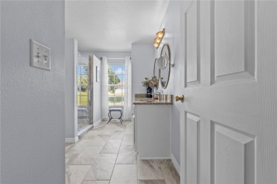 Step into refined Florida living with this beautifully upgraded on Spring Hill Golf Course in Florida - for sale on GolfHomes.com, golf home, golf lot