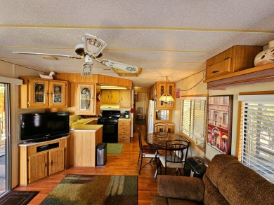 This charming 1990 1-bedroom, 1-bath mobile home is located in on Sands RV and Golf Resort in California - for sale on GolfHomes.com, golf home, golf lot