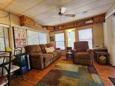 This charming 1990 1-bedroom, 1-bath mobile home is located in on Sands RV and Golf Resort in California - for sale on GolfHomes.com, golf home, golf lot