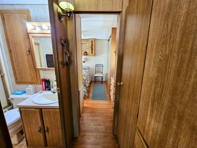 This charming 1990 1-bedroom, 1-bath mobile home is located in on Sands RV and Golf Resort in California - for sale on GolfHomes.com, golf home, golf lot