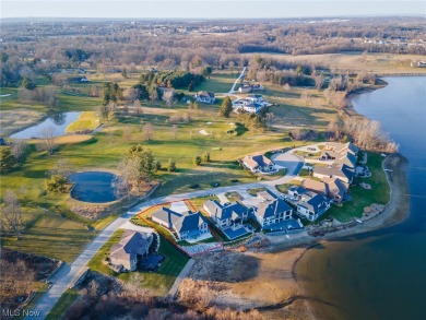 Let the alluring glow of warm flickering flame invite you to on The Lake Club in Ohio - for sale on GolfHomes.com, golf home, golf lot