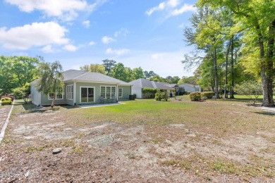 Welcome to 3210 Marsh View Drive--a meticulously maintained home on Lockwood Folly Country Club in North Carolina - for sale on GolfHomes.com, golf home, golf lot
