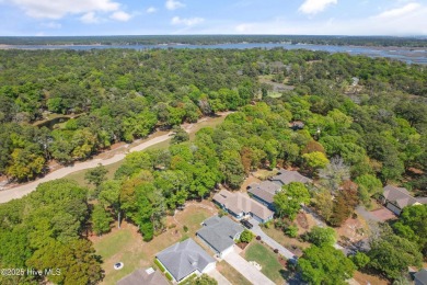 Welcome to 3210 Marsh View Drive--a meticulously maintained home on Lockwood Folly Country Club in North Carolina - for sale on GolfHomes.com, golf home, golf lot