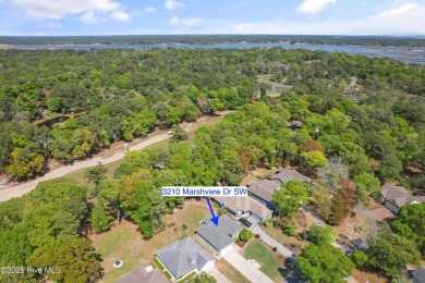 Welcome to 3210 Marsh View Drive--a meticulously maintained home on Lockwood Folly Country Club in North Carolina - for sale on GolfHomes.com, golf home, golf lot