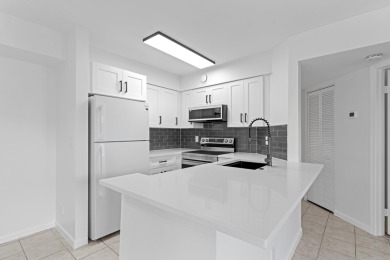 ABSOLUTELY GORGEOUS FIRST FLOOR CONDO | PRESTIGIOUS 55+ on Forest Oaks Golf Club in Florida - for sale on GolfHomes.com, golf home, golf lot