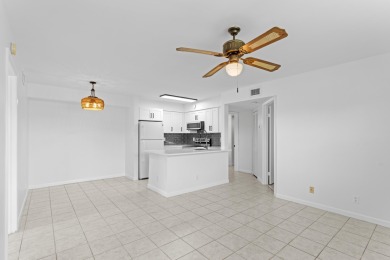 ABSOLUTELY GORGEOUS FIRST FLOOR CONDO | PRESTIGIOUS 55+ on Forest Oaks Golf Club in Florida - for sale on GolfHomes.com, golf home, golf lot