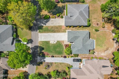 Welcome to 3210 Marsh View Drive--a meticulously maintained home on Lockwood Folly Country Club in North Carolina - for sale on GolfHomes.com, golf home, golf lot
