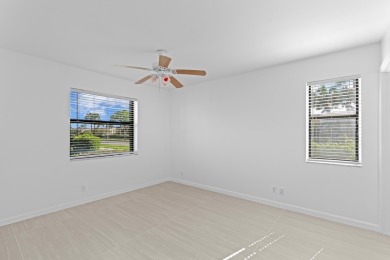 ABSOLUTELY GORGEOUS FIRST FLOOR CONDO | PRESTIGIOUS 55+ on Forest Oaks Golf Club in Florida - for sale on GolfHomes.com, golf home, golf lot