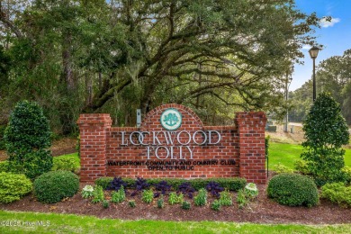 Welcome to 3210 Marsh View Drive--a meticulously maintained home on Lockwood Folly Country Club in North Carolina - for sale on GolfHomes.com, golf home, golf lot