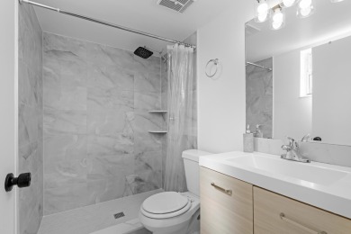 ABSOLUTELY GORGEOUS FIRST FLOOR CONDO | PRESTIGIOUS 55+ on Forest Oaks Golf Club in Florida - for sale on GolfHomes.com, golf home, golf lot