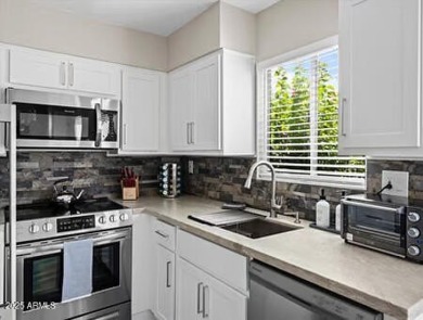 RARE- in unit washer and dryer. This stunningly updated on The Phoenician  in Arizona - for sale on GolfHomes.com, golf home, golf lot