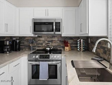 RARE- in unit washer and dryer. This stunningly updated on The Phoenician  in Arizona - for sale on GolfHomes.com, golf home, golf lot