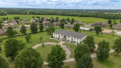 A showcase of modern elegance, this 6-bed, 7.5-bath contemporary on Paragould Country Club in Arkansas - for sale on GolfHomes.com, golf home, golf lot
