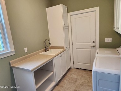 Another gorgeous custom-built home, to-be-built by Greenwatch on Lockwood Folly Country Club in North Carolina - for sale on GolfHomes.com, golf home, golf lot