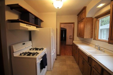 Beautifully updated Highland park home. Kitchen features updated on Highland National Golf Course in Minnesota - for sale on GolfHomes.com, golf home, golf lot