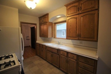 Beautifully updated Highland park home. Kitchen features updated on Highland National Golf Course in Minnesota - for sale on GolfHomes.com, golf home, golf lot