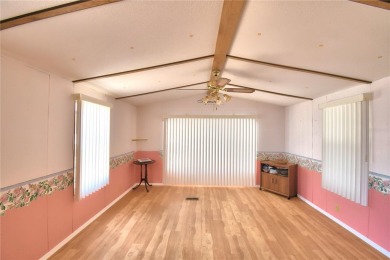 FLORIDA LIFESTYLE AT ITS BEST IN THIS HIGHLY DESIRABLE 55+ on Southern Dunes Golf and Country Club in Florida - for sale on GolfHomes.com, golf home, golf lot
