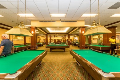 Step into this beautifully 1-bedroom, 1.5-bath residence on Flamingo Lakes Country Club in Florida - for sale on GolfHomes.com, golf home, golf lot