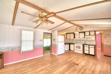 FLORIDA LIFESTYLE AT ITS BEST IN THIS HIGHLY DESIRABLE 55+ on Southern Dunes Golf and Country Club in Florida - for sale on GolfHomes.com, golf home, golf lot