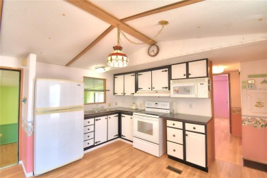 FLORIDA LIFESTYLE AT ITS BEST IN THIS HIGHLY DESIRABLE 55+ on Southern Dunes Golf and Country Club in Florida - for sale on GolfHomes.com, golf home, golf lot