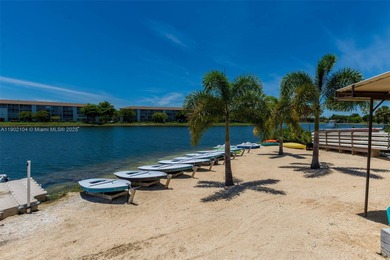 Step into this beautifully 1-bedroom, 1.5-bath residence on Flamingo Lakes Country Club in Florida - for sale on GolfHomes.com, golf home, golf lot