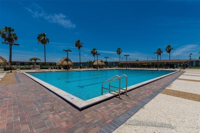 Step into this beautifully 1-bedroom, 1.5-bath residence on Flamingo Lakes Country Club in Florida - for sale on GolfHomes.com, golf home, golf lot