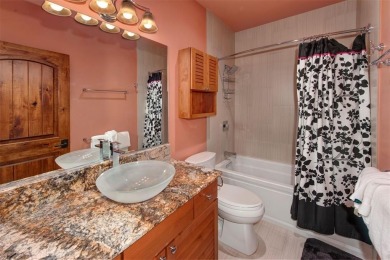 Quality-built home with warm rustic log accents and top-end on Keystone Ranch Golf Course in Colorado - for sale on GolfHomes.com, golf home, golf lot