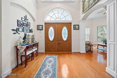 Custom 5-Bed North Hampton stunner with pond views, soaring on Golf Club At North Hampton in Florida - for sale on GolfHomes.com, golf home, golf lot