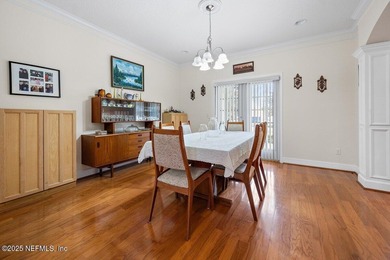 Custom 5-Bed North Hampton stunner with pond views, soaring on Golf Club At North Hampton in Florida - for sale on GolfHomes.com, golf home, golf lot