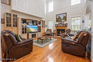 Custom 5-Bed North Hampton stunner with pond views, soaring on Golf Club At North Hampton in Florida - for sale on GolfHomes.com, golf home, golf lot