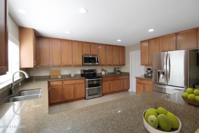 Tucked away in the coveted LPGA community, 116 Joyelle Circle is on LPGA International Golf Course in Florida - for sale on GolfHomes.com, golf home, golf lot