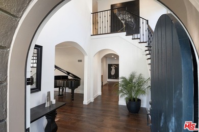 Extensively renovated and expanded Mediterranean home on Wilshire Country Club in California - for sale on GolfHomes.com, golf home, golf lot