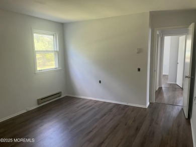 Charming 2 bedroom, 1 bath home situated on a desirable corner on Keswick Village Golf Course in New Jersey - for sale on GolfHomes.com, golf home, golf lot