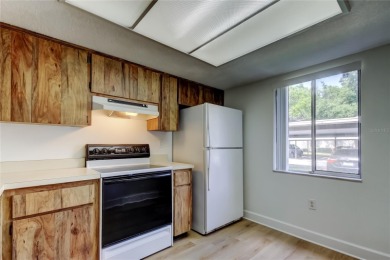 PRICED TO SELL!   This FIRST FLOOR condo located in desirable on East Lake Woodlands Country Club in Florida - for sale on GolfHomes.com, golf home, golf lot