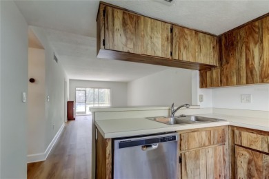 PRICED TO SELL!   This FIRST FLOOR condo located in desirable on East Lake Woodlands Country Club in Florida - for sale on GolfHomes.com, golf home, golf lot