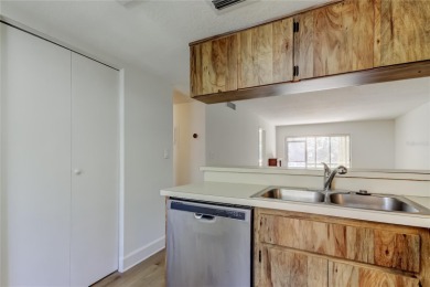 PRICED TO SELL!   This FIRST FLOOR condo located in desirable on East Lake Woodlands Country Club in Florida - for sale on GolfHomes.com, golf home, golf lot