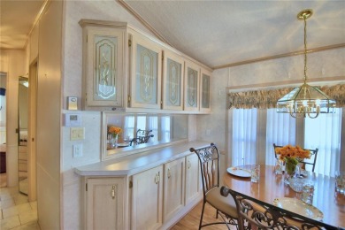 WELCOME TO YOUR FLORIDA RETIREMENT OASIS IN A GATED/GOLF CART on Southern Dunes Golf and Country Club in Florida - for sale on GolfHomes.com, golf home, golf lot