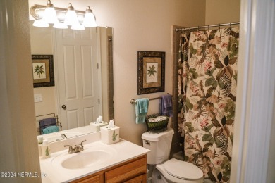 This stunning two bedroom, two bathroom, ground level condo on Eagle Harbor Golf Club in Florida - for sale on GolfHomes.com, golf home, golf lot