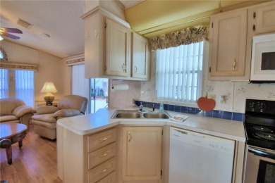 WELCOME TO YOUR FLORIDA RETIREMENT OASIS IN A GATED/GOLF CART on Southern Dunes Golf and Country Club in Florida - for sale on GolfHomes.com, golf home, golf lot