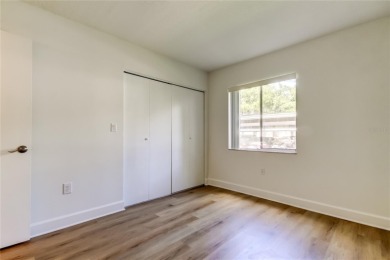PRICED TO SELL!   This FIRST FLOOR condo located in desirable on East Lake Woodlands Country Club in Florida - for sale on GolfHomes.com, golf home, golf lot