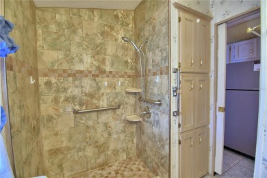 WELCOME TO YOUR FLORIDA RETIREMENT OASIS IN A GATED/GOLF CART on Southern Dunes Golf and Country Club in Florida - for sale on GolfHomes.com, golf home, golf lot