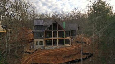 Exceptional 5-bedroom stone and cedar shake home with on Old Toccoa Farm Golf Club in Georgia - for sale on GolfHomes.com, golf home, golf lot