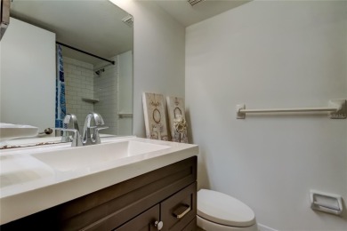 PRICED TO SELL!   This FIRST FLOOR condo located in desirable on East Lake Woodlands Country Club in Florida - for sale on GolfHomes.com, golf home, golf lot