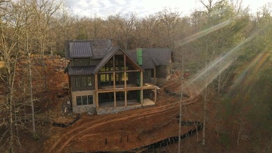 Exceptional 5-bedroom stone and cedar shake home with on Old Toccoa Farm Golf Club in Georgia - for sale on GolfHomes.com, golf home, golf lot