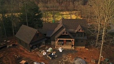 Exceptional 5-bedroom stone and cedar shake home with on Old Toccoa Farm Golf Club in Georgia - for sale on GolfHomes.com, golf home, golf lot